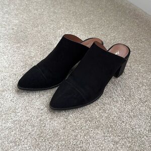 Black pointed toe mules